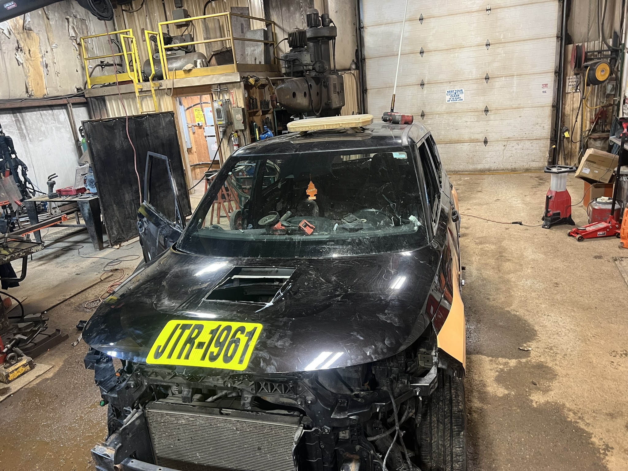 Close view of JTR service vehicle inside the shop