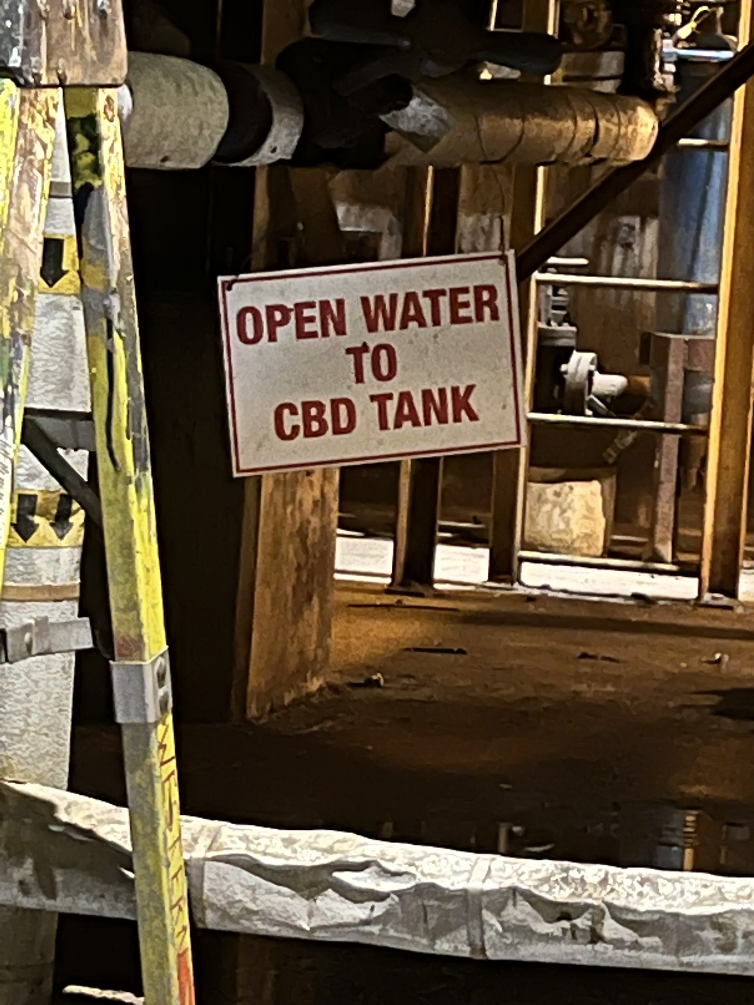 Site sign marking open water access to a CBD tank area
